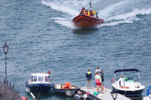 29 July 2020 - 14-18-35
Dart RNLI Antantic lifeboat arrives at the visitor's pontoon to assist a casualty injured when his boat hit a freak wave.
---------------------------
Dart RNLI launch 440